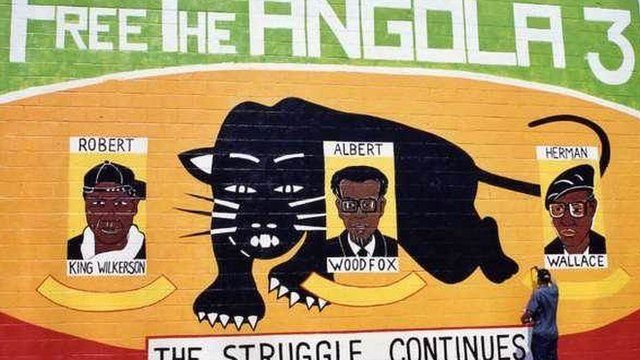 Mural en apoyo y para comemorar los 3 de Angola: Panteras Negras, que estuvieron recluidos durante décadas en confinamiento solitario en Angola.